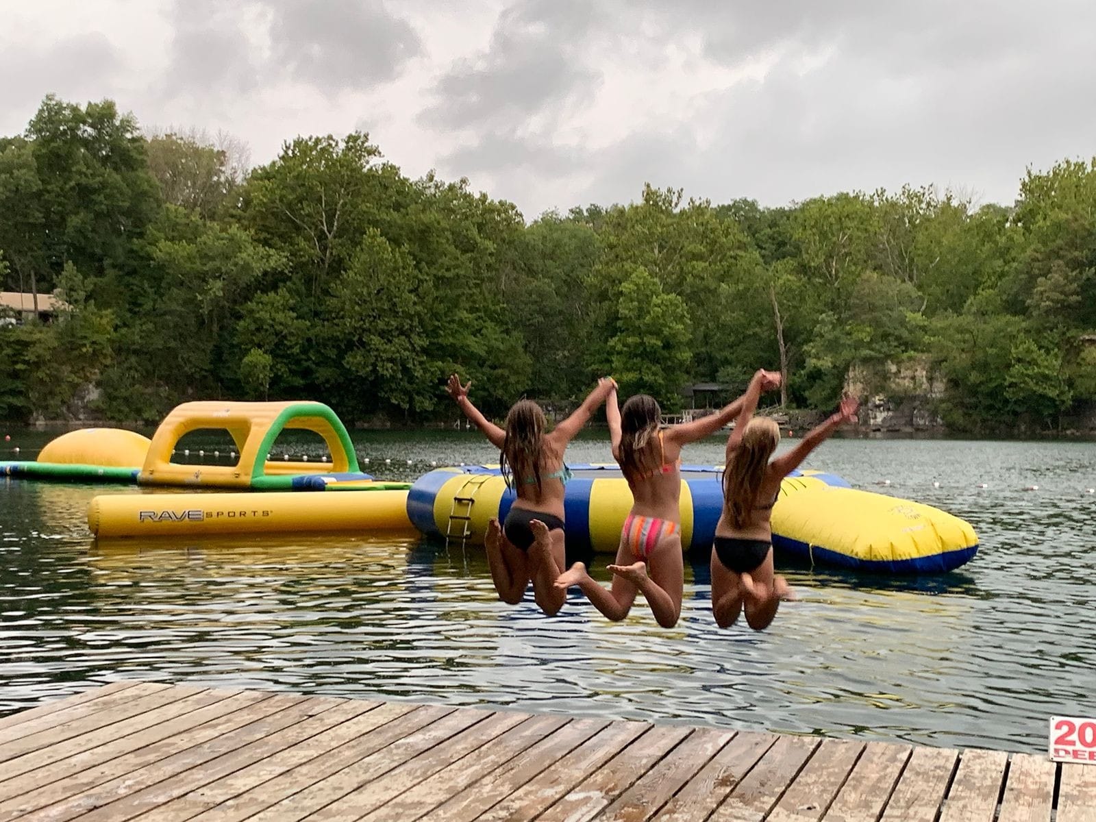 Girls Jumping Into Water